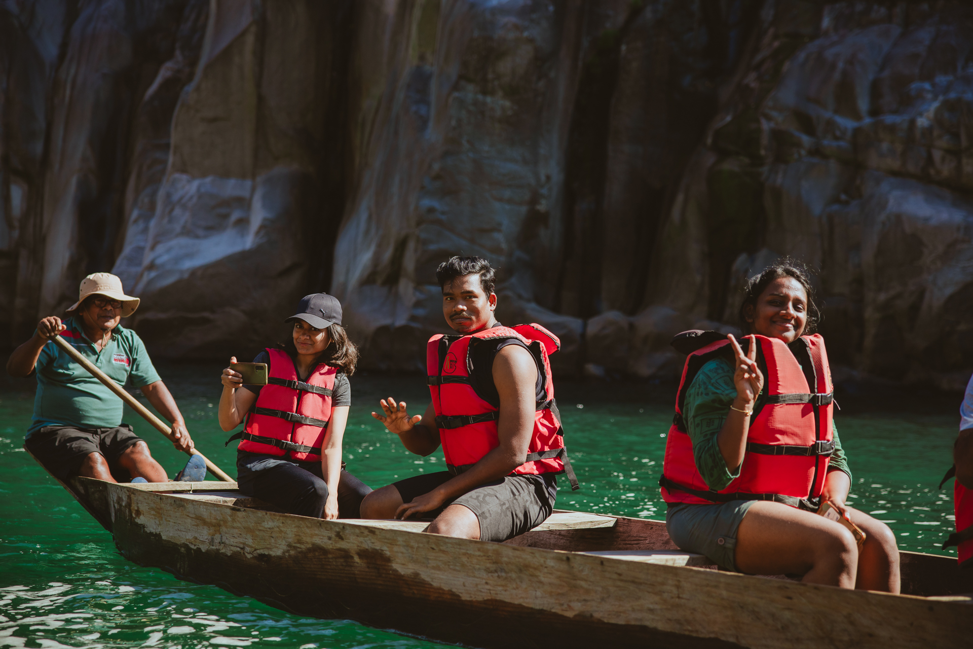 Travellers boating on the clear water in Meghalaya
